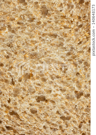 Macro texture of whole wheat bread crumb, detailed food background. Macro texture of whole wheat bread crumb, detailed food background. 140648173