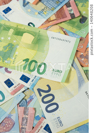 Wealth and economy concept with Euro cash wallpaper. Wealth and economy concept with Euro cash wallpaper. 140648208