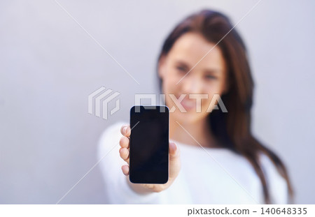 Mockup, person and smartphone on gray background with screen for connectivity, communication and mobile with technology. Studio, cellphone and interaction with internet for chat or conversation Mockup, person and smartphone on gray background with screen for connectivity, communication and mobile with technology. Studio, cellphone and interaction with internet for chat or conversation 140648335