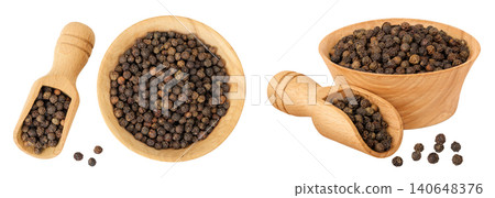 Black peppercorns or pepper in a wooden bowl isolated on a white background. Top view. Flat lay Black peppercorns or pepper in a wooden bowl isolated on a white background. Top view. Flat lay 140648376