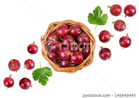 Red gooseberry in a wicker basket isolated on white background. Top view. Flat lay. Red gooseberry in a wicker basket isolated on white background. Top view. Flat lay. 140648445