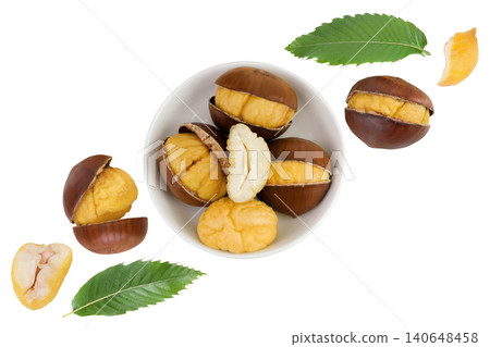 roasted peeled ceramic in wooden bowl isolated on white background. Top view. Flat lay. roasted peeled ceramic in wooden bowl isolated on white background. Top view. Flat lay. 140648458