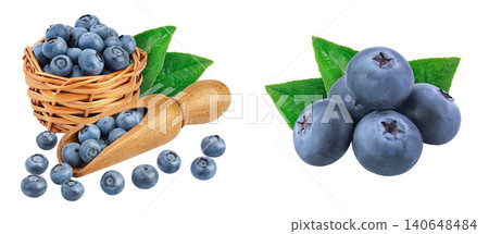 blueberry in wooden scoop isolated on white background blueberry in wooden scoop isolated on white background 140648484