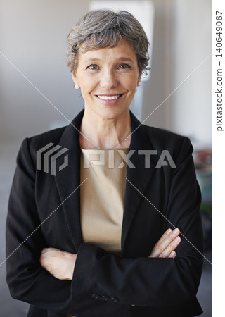 Mature, businesswoman and portrait as corporate professional for financial advisor or advice, investment or accounting. Female person, face and arms crossed in office for pride, trust or confidence 140649087