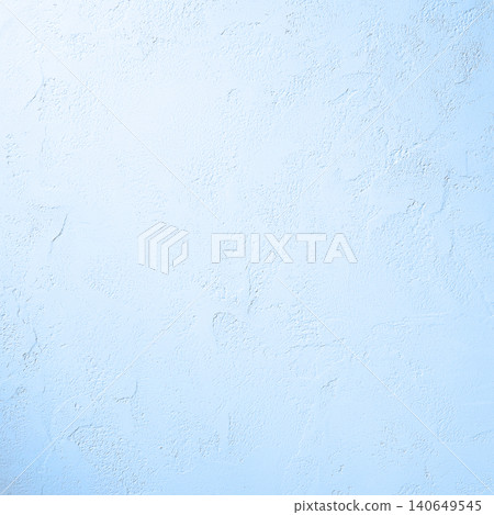 A square background image of a plaster wall with trowel marks visible, illuminated by a pale blue light. A square background image of a plaster wall with trowel marks visible, illuminated by a pale blue light. 140649545