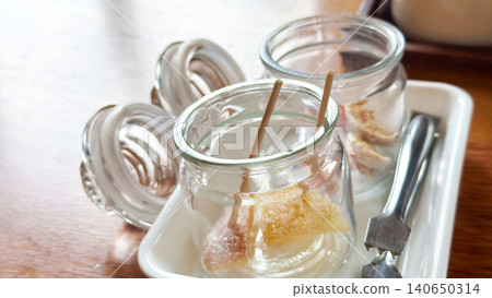 Orange peel in a glass bottle Orange peel in a glass bottle 140650314
