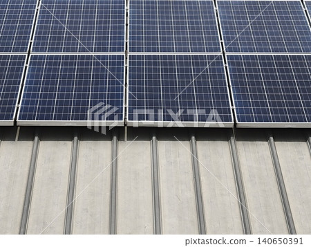 Solar Panel Array Installed on Industrial Metal Roof Solar Panel Array Installed on Industrial Metal Roof 140650391