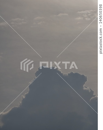 Towering Cumulus Storm Cloud Formation in Grey Sky Towering Cumulus Storm Cloud Formation in Grey Sky 140650398