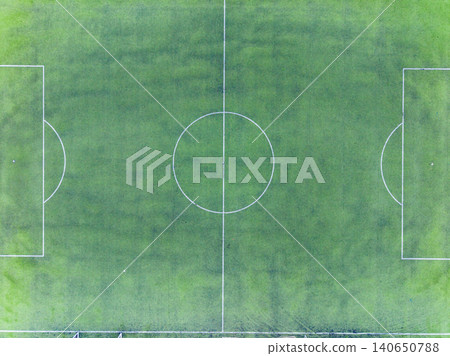 Soccer field viewed from above with clear lines and a well-maintained surface ready for play during the day 140650788