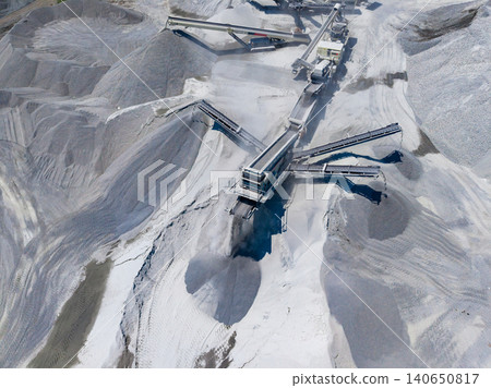 Equipment and processes in a granite quarry during daytime operations for stone extraction and processing Equipment and processes in a granite quarry during daytime operations for stone extraction and processing 140650817