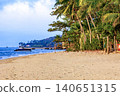 A beach among coconut trees 140651315