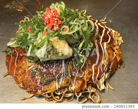 Oyster okonomiyaki on a hot plate, Hiroshima style 140651363