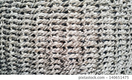 Natural woven pouf ottoman stool for living room interior Natural woven pouf ottoman stool for living room interior 140651475