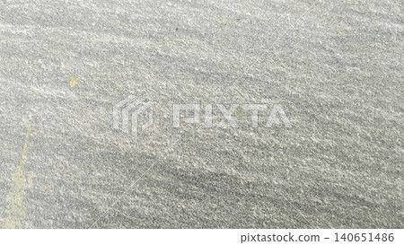 Textured grey ceramic paving tile background with white paint splatters Textured grey ceramic paving tile background with white paint splatters 140651486