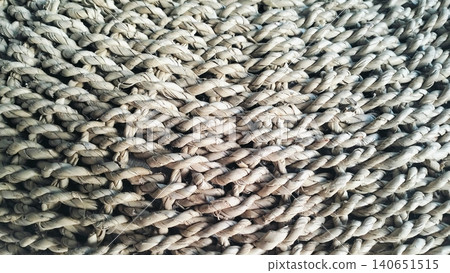 Natural woven pouf ottoman stool for living room interior 140651515