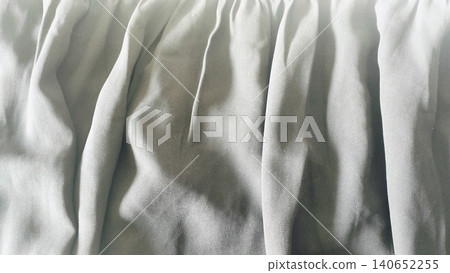 Close-up of dark black textile surface, elegant drapery material backdrop. Close-up of dark black textile surface, elegant drapery material backdrop. 140652255