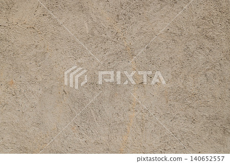 Close-Up of Rough Textured Beige Concrete Wall Surface 140652557