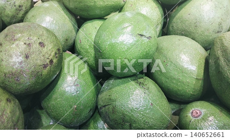 Close-up of fresh green organic avocados background 140652661