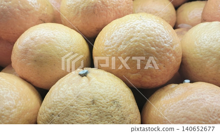 Close-up of fresh whole orange citrus fruits background Close-up of fresh whole orange citrus fruits background 140652677