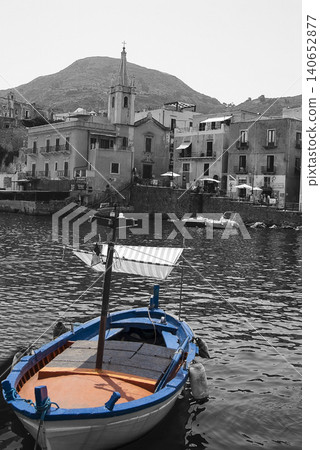 Blue fishing boat in southern Italy harbor selective color Blue fishing boat in southern Italy harbor selective color 140652877
