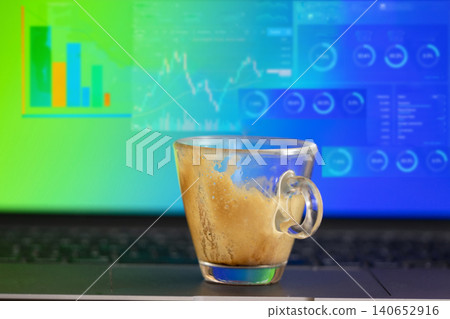 Empty espresso cup on laptop with break message on screen Empty espresso cup on laptop with break message on screen 140652916