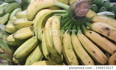 Fresh bunches of lady finger bananas with visible stems background. 140653027