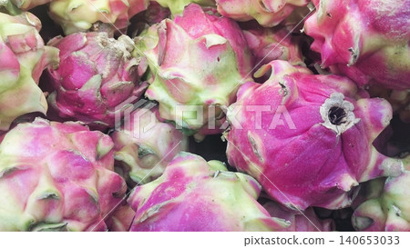 Close-up of fresh whole pink dragon fruits background 140653033