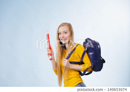 Young woman going to school Young woman going to school 140653074