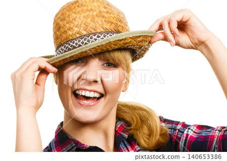 Portait smiling woman wearing sun hat and shirt Portait smiling woman wearing sun hat and shirt 140653386
