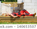 Woman taking break on construction site 140653507