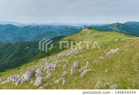 The plateau landscape of the Shikoku Karst, with its vast limestone formations. The plateau landscape of the Shikoku Karst, with its vast limestone formations. 140654034