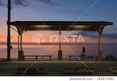 Shimonada Station platform bathed in the evening light Shimonada Station platform bathed in the evening light 140654083