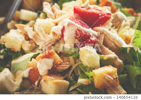 classic Caesar salad, close-up, natural light, selective focus, horizontal, classic Caesar salad, close-up, natural light, selective focus, horizontal, 140654116