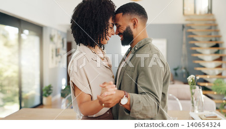 Home, dancing and couple with love, happiness and dating with celebration and anniversary. Apartment, movement and man with woman and cheerful with romance and holding hands with relationship and joy Home, dancing and couple with love, happiness and dating with celebration and anniversary. Apartment, movement and man with woman and cheerful with romance and holding hands with relationship and joy 140654324