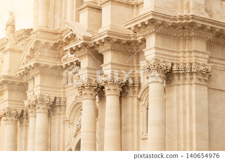 Majestic ancient Roman temple facade with intricate marble columns and sculptures Majestic ancient Roman temple facade with intricate marble columns and sculptures 140654976