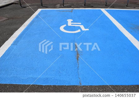 Wheelchair mark caring parking lot 140655037
