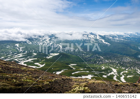 Scenes from a climb of Mt. Asahidake in early summer, with lingering snow. Scenes from a climb of Mt. Asahidake in early summer, with lingering snow. 140655142