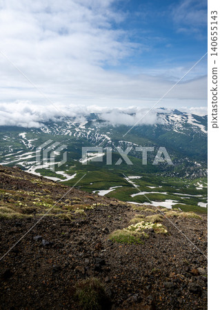 Scenes from a climb of Mt. Asahidake in early summer, with lingering snow. Scenes from a climb of Mt. Asahidake in early summer, with lingering snow. 140655143