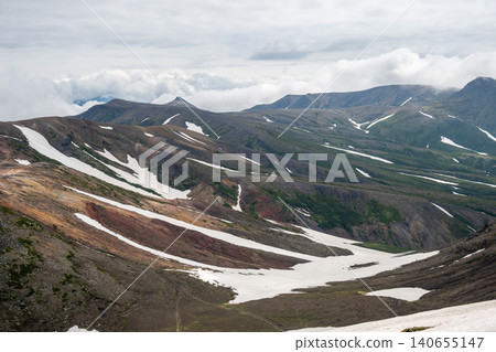 Scenes from a climb of Mt. Asahidake in early summer, with lingering snow. Scenes from a climb of Mt. Asahidake in early summer, with lingering snow. 140655147