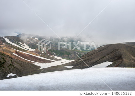 Scenes from a climb of Mt. Asahidake in early summer, with lingering snow. Scenes from a climb of Mt. Asahidake in early summer, with lingering snow. 140655152