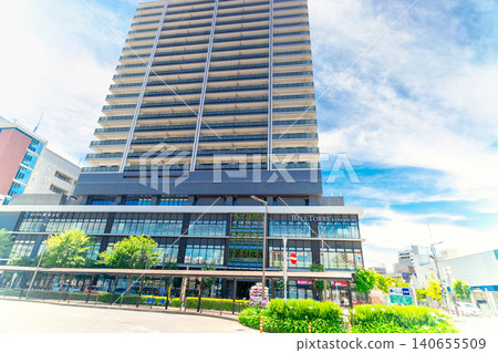 Tower apartment building near the south exit of Kanemachi Station on the JR Joban Line in Tokyo. Tower apartment building near the south exit of Kanemachi Station on the JR Joban Line in Tokyo. 140655509