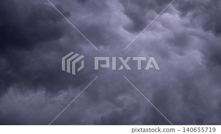 Dramatic clouds background Gloomy Sky Imagery. Dark Clouds With Subtle Highlights. Silent Gray Clouds Evoke Suspenseful Moods. Layered Storm Clouds Create Versatile Atmospheric Backgrounds Today 140655719