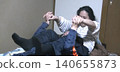 A tall woman who performs hypnosis 140655873