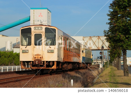 A Mizushima Rinkai Railway MRT300 series diesel railcar departing from Kurashiki Freight Terminal, located in an industrial area. (Photo taken on June 18, 2026) A Mizushima Rinkai Railway MRT300 series diesel railcar departing from Kurashiki Freight Terminal, located in an industrial area. (Photo taken on June 18, 2026) 140656018