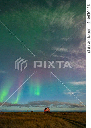 Aurora borealis in Iceland (pink, green, and night sky) Aurora borealis in Iceland (pink, green, and night sky) 140656418