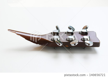 part of broken wood acoustic guitar isolated on white background part of broken wood acoustic guitar isolated on white background 140656721