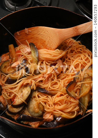 Cooking eggplant and tuna pasta in tomato sauce Cooking eggplant and tuna pasta in tomato sauce 140657293