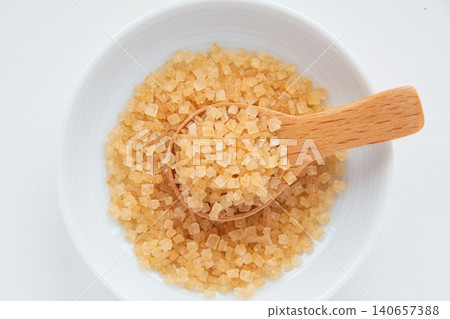 Coarse sugar in a small dish Coarse sugar in a small dish 140657388
