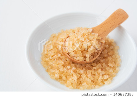 Coarse sugar in a small dish Coarse sugar in a small dish 140657393