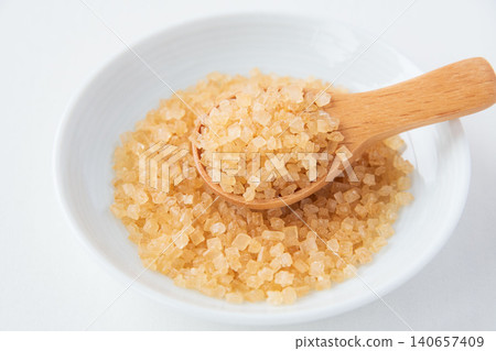 Coarse sugar in a small dish Coarse sugar in a small dish 140657409